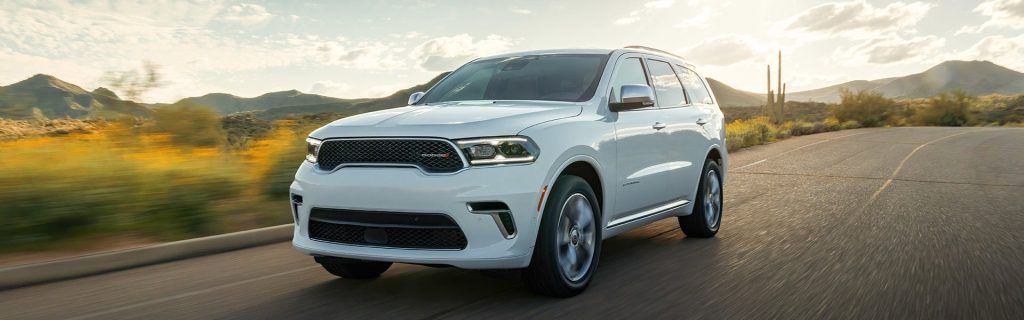 White Dodge Durango driving